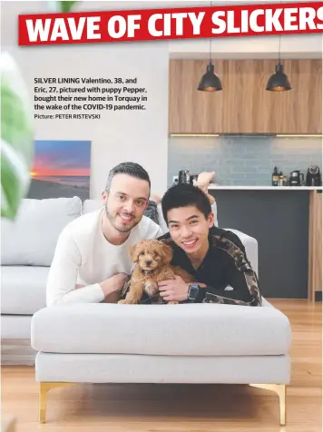  ?? Picture: PETER RISTEVSKI ?? SILVER LINING Valentino, 38, and Eric, 27, pictured with puppy Pepper, bought their new home in Torquay in the wake of the COVID-19 pandemic.