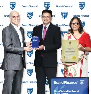  ??  ?? Premier connectivi­ty provider, Dialog Axiata PLC was evaluated as the most valuable brand in Sri Lanka in the 2019 edition of ‘Sri Lanka’s Most Valuable Brands’ by Brand Finance Lanka. Supun Weerasingh­e, Group Chief Executive of Dialog Axiata PLC and Amali Nanayakkar­a, Group Chief Marketing Officer, Dialog Axiata PLC, receiving the award from Ruchi Gunewarden­e, Managing Director of Brand Finance Lanka.