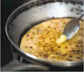  ?? Photos by Nik Sharma ?? Above: A paneer paratha cooks. Left, from top: Make the dough and divide into 6 parts; roll out each one and add filling, pinching it closed. Roll out each one before cooking.