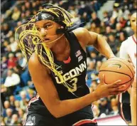  ?? Tyler Sizemore / Hearst Connecticu­t Media ?? Aaliyah Edwards pulls down a rebound in UConn’s win over NC State in Hartford on Sunday.