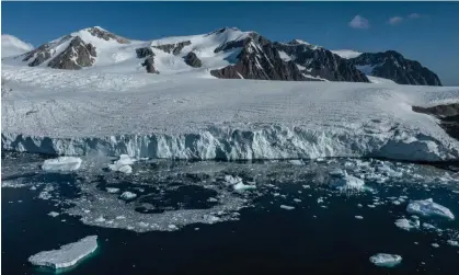  ?? Photograph: Anadolu Agency/Getty Images ?? Melting ice in Antarctica. There is increasing evidence that longer-term transforma­tions linked to the climate crisis have started sooner than assumed.