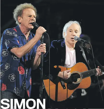  ?? STEPHEN
LOVEKIN/GETTY IMAGES ?? Above: Art Garfunkel and Paul Simon perform onstage at the 25th Anniversar­y Rock and Roll Hall of Fame Concert in 2009.