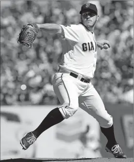  ?? JEFF CHIU/AP PHOTO ?? Giants pitcher Ty Blach throws in the first inning of Saturday’s game against the Dodgers at San Francisco. The Giants won 3-0.