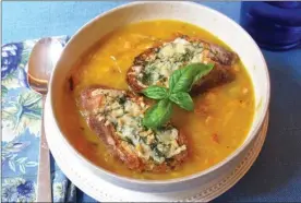  ?? Sara Moulton via AP ?? Butternut squash and leek soup with gruyere pesto toast.