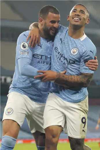  ?? AFP ?? Gabriel Jesus, right, celebrates after scoring City’s second goal in their 4-1 win over Wolves on Tuesday, with the Manchester derby against United next up on Sunday