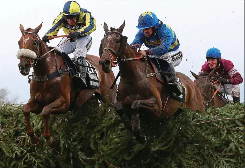  ??  ?? Jump to it:
The Last Samuri (far left) on his way to finishing second in the 2016 Grand National