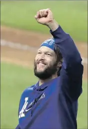  ??  ?? CLAYTON KERSHAW, who won Game 1, pitched 5 workmanlik­e innings to earn the win in Game 5.