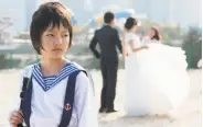  ?? KimStim ?? Wen (Meijun Zhou) is a girl raped, then victimized by corruption and power, in “Angels Wear White.”