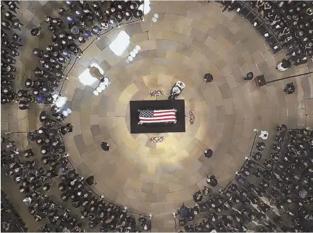  ?? AP PHOTOS ?? FITTING HONOR: The body of U.S. Sen. John McCain lies in state at the Capitol building, above, in Washington, D.C. Mourners, including his 106-year-old mother Roberta, top, and political heavyweigh­ts, top right, paid their respects.