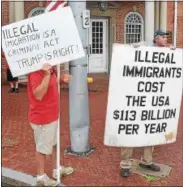  ?? PETE BANNAN – DIGITAL FIRST MEDIA ?? Counter-protesters across the street stand in support of President Trump’s immigratio­n policies.