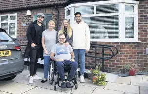  ??  ?? ●●Adam Thomas, Adam Kamani with Carly, Ronnie and Pamela at their home