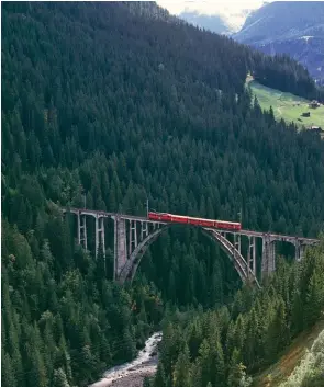  ??  ?? Below: The Langwieser Viaduct provides another spectacula­r river crossing on the way to Davos; completed in 1914, this was the world’s first railway bridge to be built from reinforced concrete.
