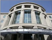  ?? CAROLYN KASTER, FILE - THE ASSOCIATED PRESS ?? This 2009 file photo shows the Pennsylvan­ia Judicial Center shortly after its completion in Harrisburg, Pa. The fate of a constituti­onal amendment for victims’ rights that Pennsylvan­ia voters apparently approved overwhelmi­ngly nearly two years ago is about to go before the state’s highest court. The state Supreme Court justices will hear oral argument in Harrisburg Tuesday regarding whether the so-called Marsy’s Law amendment should have been split into more than just one ballot question. The court is considerin­g whether to uphold a divided decision in January by Commonweal­th Court. The lower court ruled it ran afoul of a Pennsylvan­ia Constituti­on provision that requires amendments to address a single subject only.