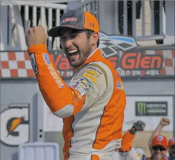  ?? AP ?? Chase Elliott won his first Cup race on a road course, just as his father did. “It’s something I’ll never forget,” said Elliott, who has finished second eight times.