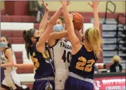  ?? AUSTIN HERTZOG - MEDIANEWS GROUP ?? Pottsgrove’s Sydney Mowery (40) is collapsed on by Mount St. Joseph defenders Georgia Pickett, left, and Grace Niekelski during their District 1-5A first round playoff game Saturday.