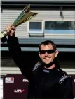  ??  ?? SIDEWINDER: Liam Burke celebrates winning round 3 of the national drifting championsh­ips in Timaru on Saturday. Image Simon Chapman.