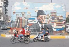  ?? ?? A mural of Iraqi author Ali al-Wardi in Baghdad.