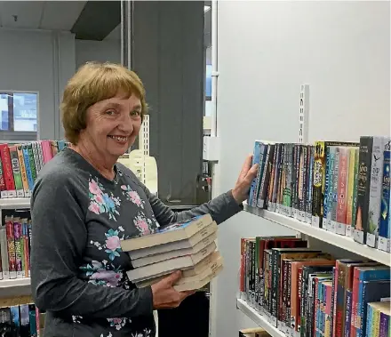  ?? MATTHEW TSO/STUFF ?? Upper Hutt City Council libraries manager Marion Read said it was great to have services back up and running for customers.