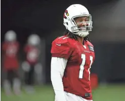  ?? ROB SCHUMACHER/THE REPUBLIC ?? Cardinals receiver Larry Fitzgerald on Thursday begins preparatio­n for his 16th season.