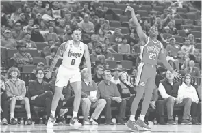  ?? STEVEN BRANSCOMBE/USA TODAY SPORTS ?? Ohio State’s Malaki Branham tied the Buckeyes’ single-game freshman record with six 3-pointers in an 87-79 overtime win over Nebraska.