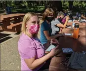  ?? ?? Caitlyn Patterson won the first Bingo game Sunday and was awarded a Beatniks gift card and a free meal at Madison Bear Garden.