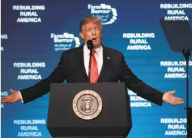  ?? Mark Humphrey / Associated Press ?? President Trump addresses the American Farm Bureau Federation’s annual convention in Nashville. He argued farmers will benefit from the tax overhaul.