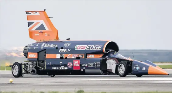  ?? Carl Court ?? > The Bloodhound supersonic car, driven by Royal Air Force Wing Commander Andy Green, on a test run at Cornwall Airport Newquay, yesterday