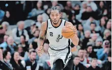  ?? ERIC GAY THE ASSOCIATED PRESS ?? San Antonio Spurs’ Kawhi Leonard, under contract through next season, will be eligible to be offered the supermax contract this summer, a five-year deal worth around $220 million.