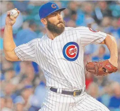  ?? | JONATHAN DANIEL/ GETTY IMAGES ?? Right- hander Jake Arrieta allowed two hits in six scoreless innings Tuesday against the Pirates.