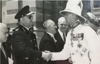  ?? ?? Inspector Magri greeting personalit­ies (circa. 1950s)