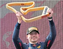  ??  ?? Max Verstappen’s win drew huge cheers from fans.