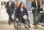  ?? J. Scott Applewhite / Associated Press ?? Sen. Tammy Duckworth, D-Ill., who lost both legs in fighting in Iraq, has a baby due in April.