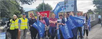  ??  ?? Teachers at Norton Knatchbull School in Ashford on strike over cuts to education, job losses and pay