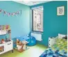  ??  ?? A child’s room combines blue and green. The room’s dweller helped picked the floor’s tone.