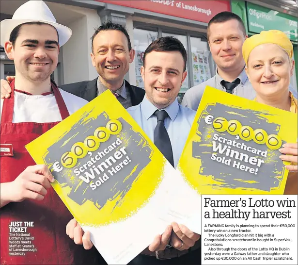  ??  ?? JUST THE TICKET The National Lottery’s David Woods meets staff at Keane’s of Lanesborou­gh yesterday