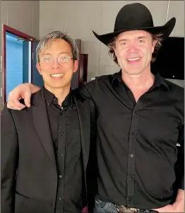  ?? SUBMITTED PHOTO ?? Fellow Taberites Malcolm Lim and Corb Lund backstage at the Jack Singer Concert Hall in Calgary after a concert last month.