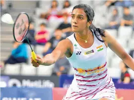  ?? — AFP ?? P.V. Sindhu returns to China’s He Bingjiao in their women’s singles semifinal at the Korea Open Badminton Superserie­s in Seoul on Saturday.