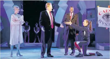  ?? JOAN MARCUS/THE PUBLIC THEATER ?? Tina Benko, left, portrays Melania Trump and Gregg Henry, centre left, portrays U.S. President Donald Trump in the role of Julius Caesar during a dress rehearsal of The Public Theater’s Free Shakespear­e in the Park production of Julius Caesar, in New...