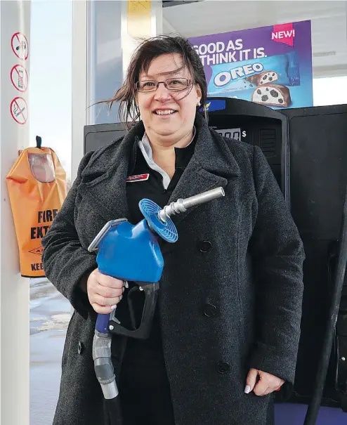  ?? — JIL MCINTOSH/DRIVING.CA ?? Elizabeth Manetta has been a service station mainstay since getting her first job in the 1990s.