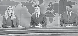  ?? PROVIDED BY WILL HEATH/ NBC ?? Cecily Strong as Rep. Marjorie Taylor Greene stopped by Weekend Update on “Saturday Night Live,” with Colin Jost, center, and Michael Che, to share her NSFW views on gender.