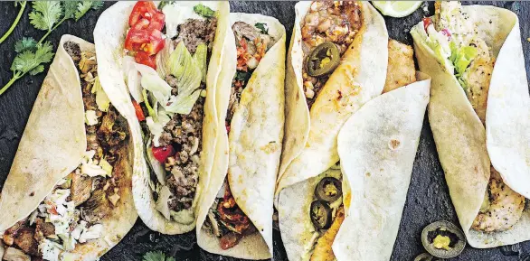  ?? PHOTOS: ANGIE MOSIER ?? These beef brisket tacos — found in Eddie Hernandez and Susan Puckett’s cookbook Turnip Greens & Tortillas — pair well with Pico de Gallo.