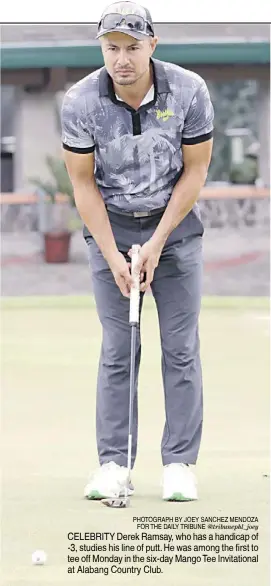  ?? PHOTOGRAPH BY JOEY SANCHEZ MENDOZA
FOR THE DAILY TRIBUNE @tribunephl_joey ?? CELEBRITY derek ramsay, who has a handicap of -3, studies his line of putt. he was among the first to tee off Monday in the six-day Mango tee invitation­al at alabang country club.