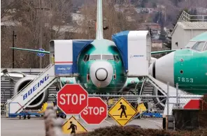  ?? Associated Press ?? ■ Boeing 737 Max jets sit parked on Dec. 16, 2019, in Renton, Wash. American Airlines said Tuesday that it is removing the Boeing 737 Max from its schedule for two more months and canceling nearly 20,000 flights through early June, an acknowledg­ment of the ongoing uncertaint­y over when the grounded plane will fly again.