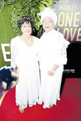  ?? RUDOLPH BROWN ?? Judy Mowatt (left) and Marcia Griffiths, members of the I-Three female trio who provided backing vocals for Bob Marley, chose white, the colour of the tribe of Joseph to honour him at the ‘Bob Marley: One Love’ Jamaica premiere at Carib 5 in Kingston on Tuesday January 23. As a Rastafaria­n, Marley’s February birthday means that he is ‘Joseph’.