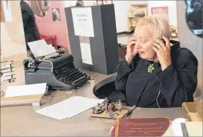  ?? ERIN POTTIE/CAPE BRETON POST ?? Janice Harris of North Sydney played the role of Annie Butler Smith, the telegraphi­st who on Nov. 10, 1918, had received an encrypted message in Morse code announcing the First World War would end. On Saturday, the North Sydney museum served as the Western Union office for the day as the former structure has since been demolished.