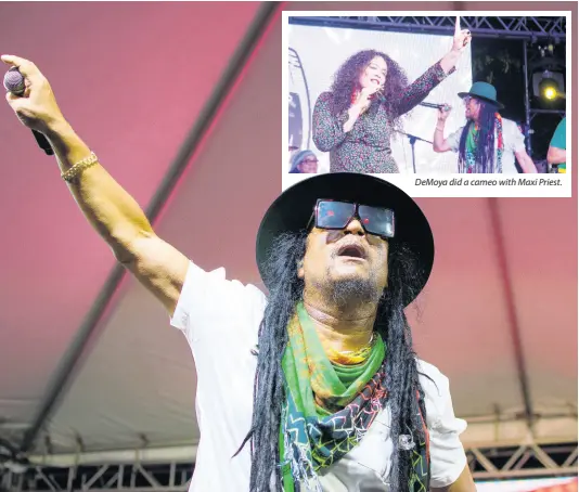 ??  ?? DeMoya did a cameo with Maxi Priest. Headliner Maxi Priest performing at Appleton Estate’s National Rum Day celebratio­ns at Murray’s Chillin’ in Clarendon on Friday night.