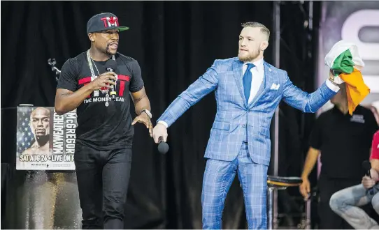  ?? ERNEST DOROSZUK ?? Undefeated boxing champion Floyd Mayweather has taken on the role of villain while UFC champion Conor McGregor is the foul-mouthed people’s choice on this four-city tour to promote their upcoming boxing match, which made a stop on Wednesday in Toronto,...