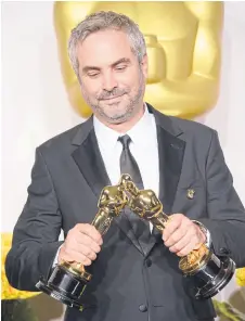  ?? EFE ?? En 2014, Alfonso Cuarón se llevó dos Oscar, mejor dirección y dirección, por su película Gravedad