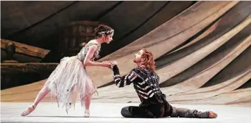  ??  ?? Karina Gonzalez and Ian Casady are well matched as Miranda and Prospero in David Bintley’s “The Tempest.”