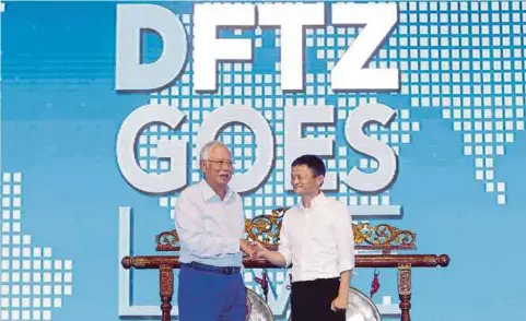  ??  ?? NAJIB bersama Jack Ma selepas majlis pelancaran Zon Bebas Perdaganga­n Digital Goes Live di Litar Antarabang­sa Sepang, semalam.